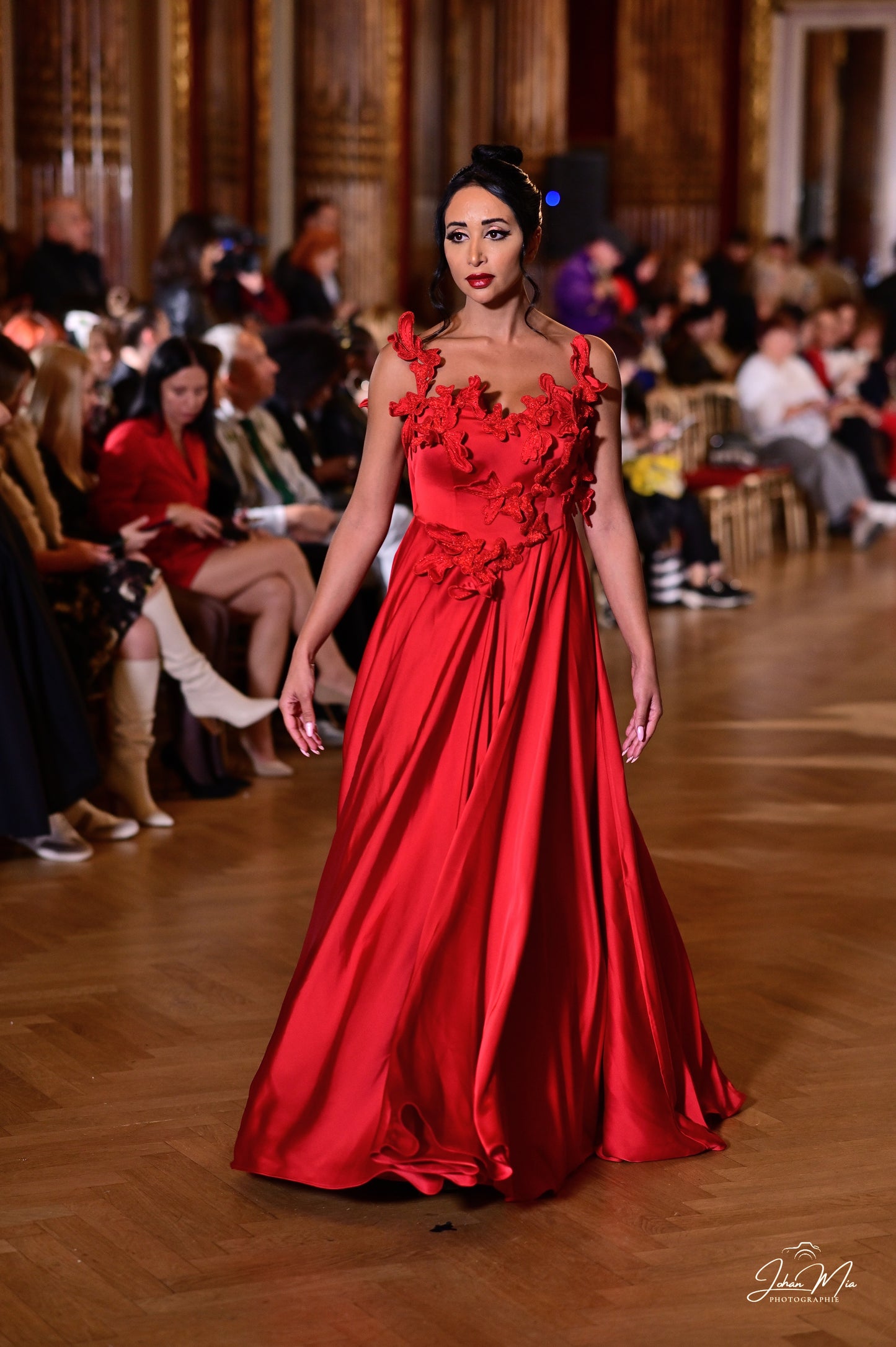 Show-Stopping Red Gown with Floral Appliqué Detailing