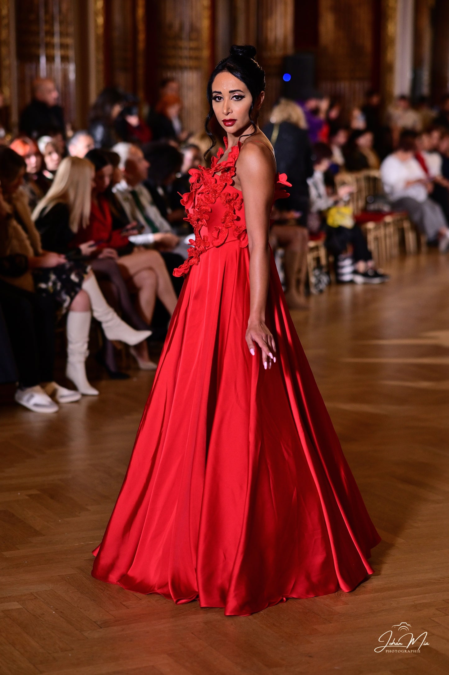 Show-Stopping Red Gown with Floral Appliqué Detailing