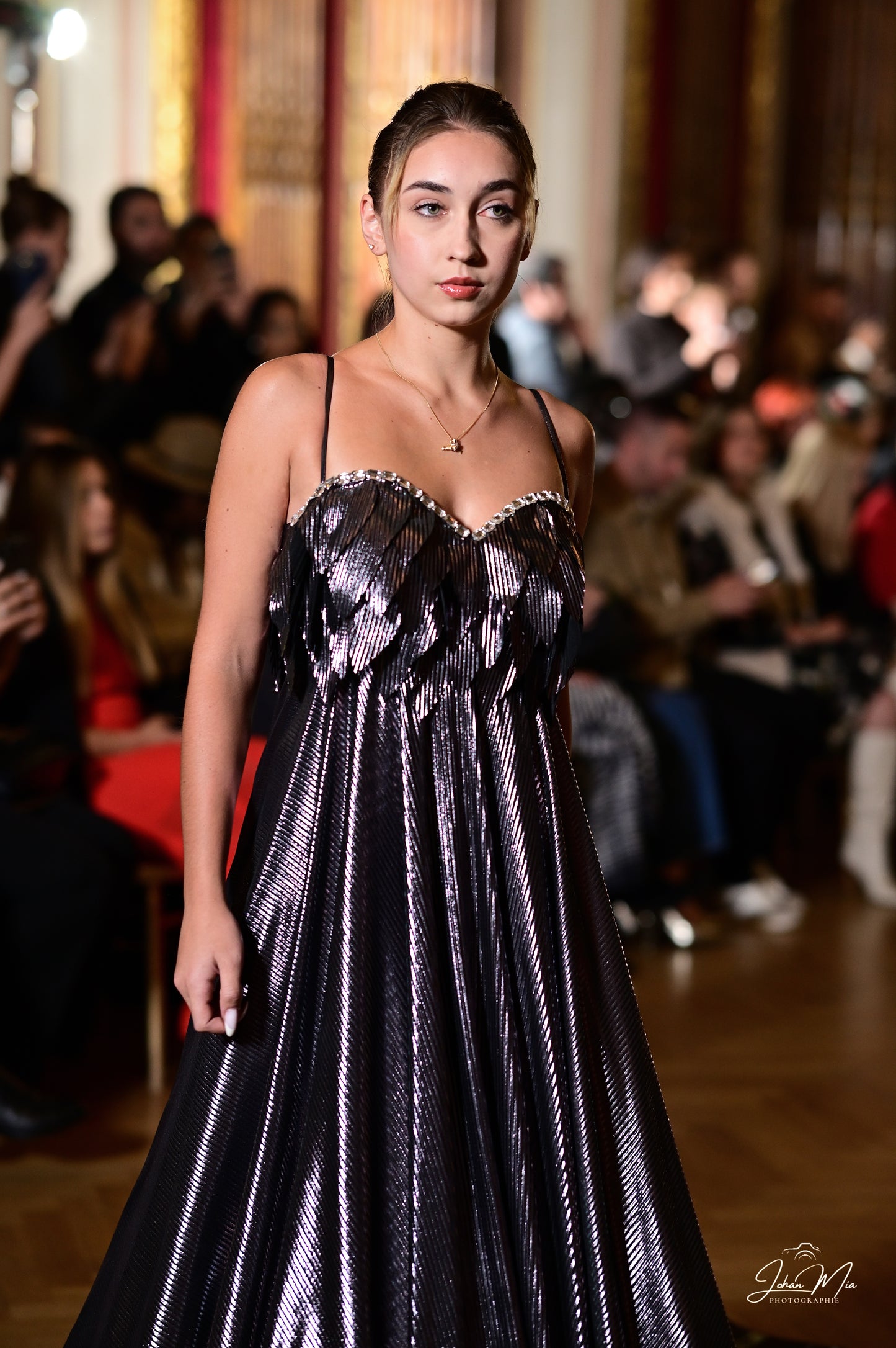 Sleek Black Metallic Gown with Textured Bodice Detailing