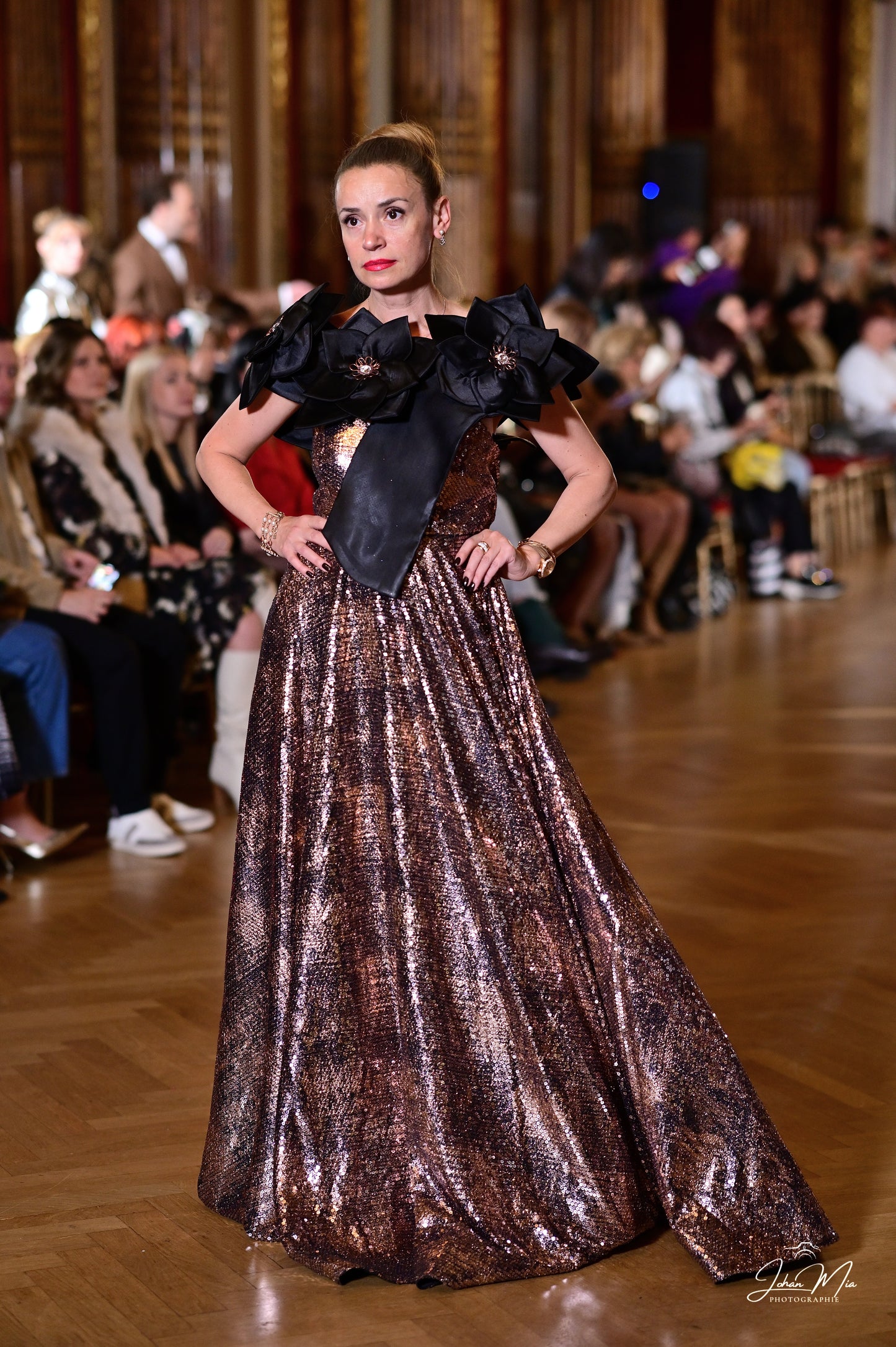 Dazzling Bronze Sequin Gown with Black Floral Shoulder Embellishment