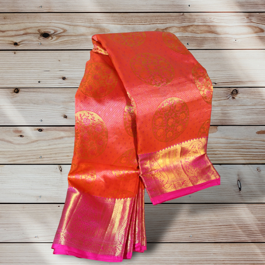 Exquisite Orange & Pink Kanjivaram Silk Saree with Intricate Gold Motifs