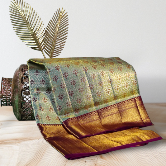 Elegant Green and Maroon Kanchi Silk Saree with Floral Zari Design