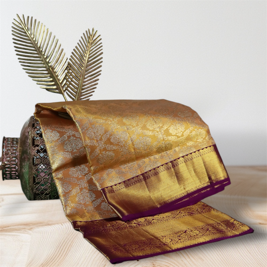Majestic Gold and Purple Kanchi Silk Saree with Intricate Zari Motifs